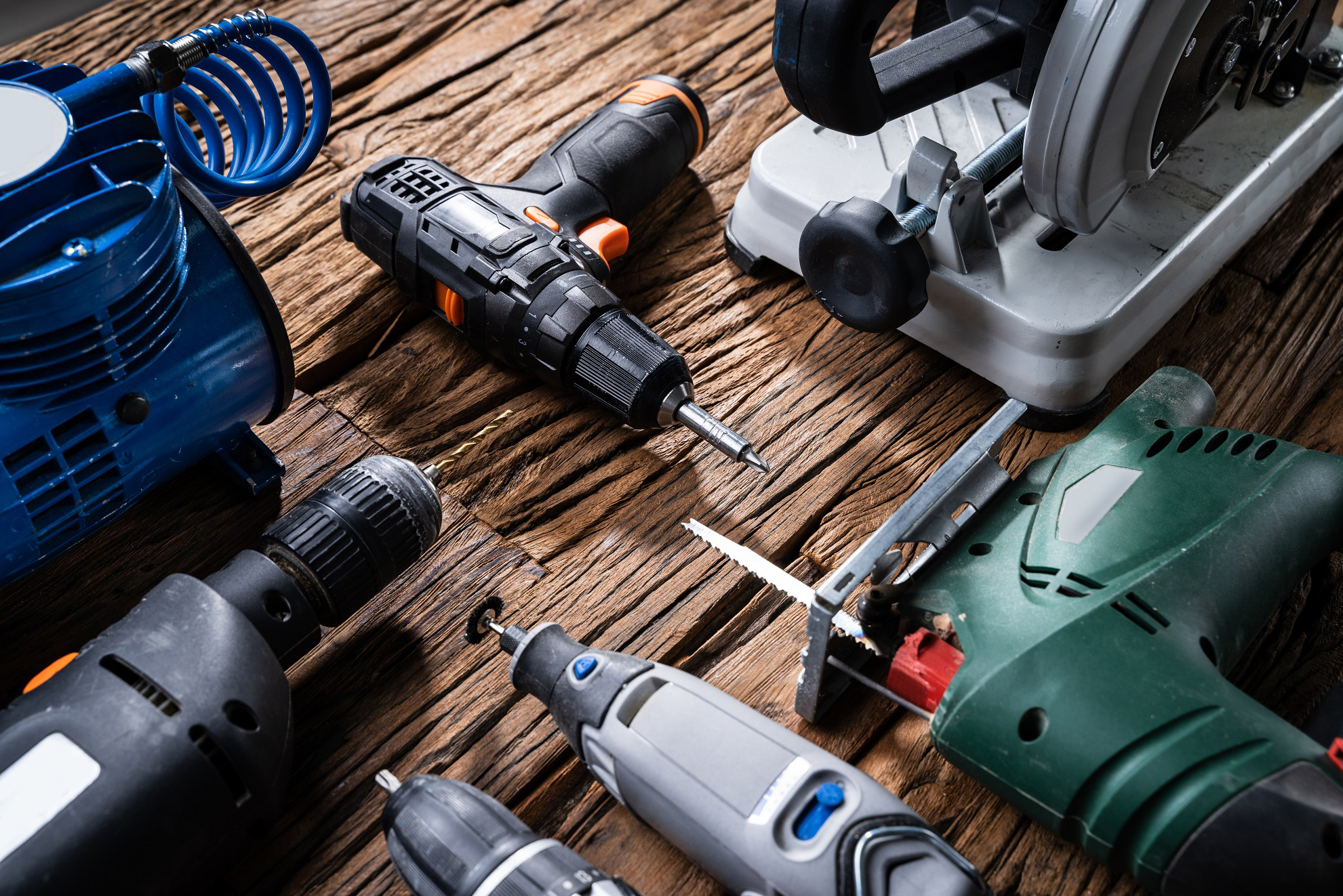 power tools on wooden desk